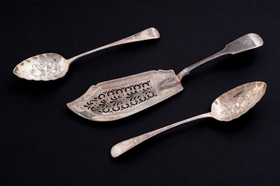 Lot 559 - A silver fish slice; and two berry spoons