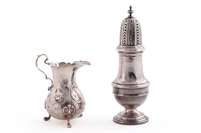 Lot 471 - A Victorian silver cream jug; and a sugar caster