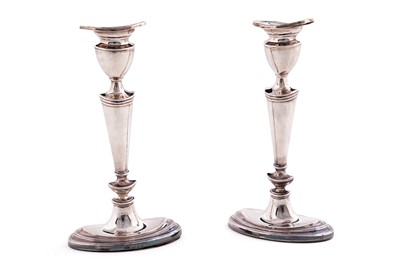 Lot 474 - A pair of silver candlesticks