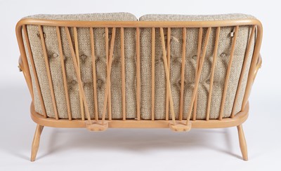 Lot 18 - Ercol: a model 766 ‘Jubilee’ beech framed two seat sofa