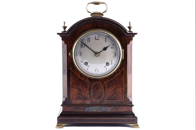 Lot 139 - A early 20th Century inlaid mahogany 8 day mantel clock