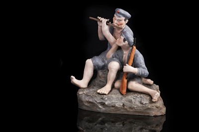 Lot 315 - A Chinese porcelain Cultural Revolution group depicting two soldiers on a rocky base