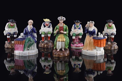 Lot 227 - A group of Staffordshire porcelaneous figures