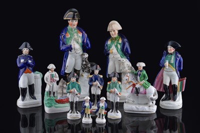 Lot 230 - Eleven Staffordshire figures of Napoleon