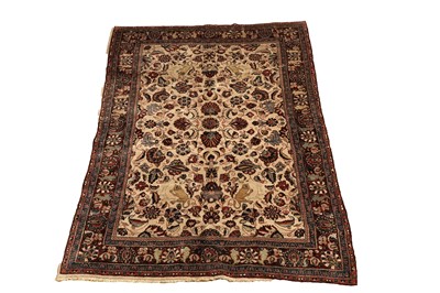 Lot 514 - A hand knotted Persian Kashan rug