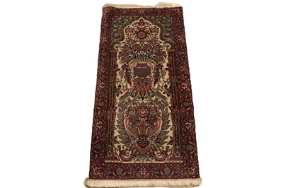 Lot 515 - A hand knotted Persian Tabriz rug