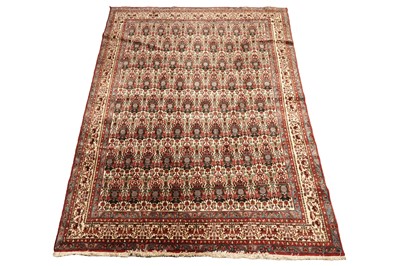 Lot 518 - A hand knotted Persian Kirmin carpet