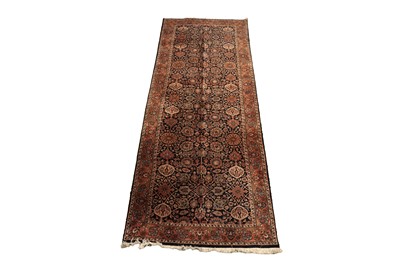 Lot 525 - A hand knotted Persian Kashan carpet