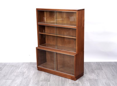 Lot 73 - Attributed to Minty: a mid-Century teak waterfall sectional bookcase