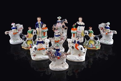 Lot 240 - A group of Staffordshire figures
