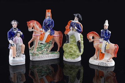 Lot 247 - Four Staffordshire figures