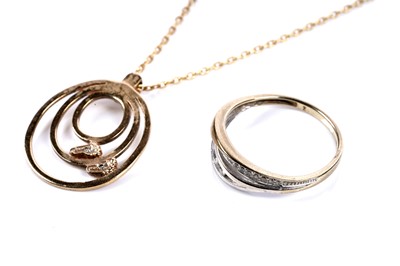 Lot 588 - A modern 18ct gold necklace; and a 9ct gold ring