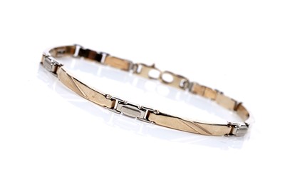 Lot 593 - A modern 14ct yellow and white gold bracelet