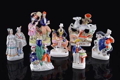 Lot 262 - Seven Staffordshire figures