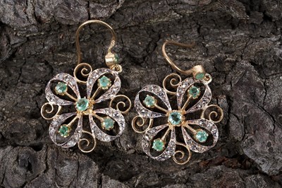 Lot 577 - A pair of 19th Century style emerald and diamond pendant earrings