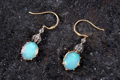 Lot 578 - A pair of Edwardian style opal and diamond pendant earrings