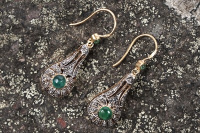 Lot 579 - A pair of emerald and diamond pendant earrings