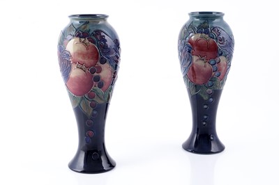 Lot 299 - A pair of Moorcroft bulbous ‘Finches’ pattern vases