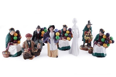 Lot 376 - A collection of seven ceramic Royal Doulton figurines; and another figure by Spode