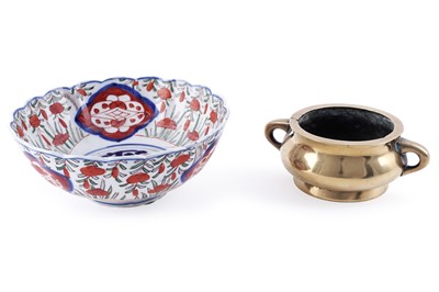 Lot 409 - A Japanese Imari pattern bowl; and a small gilt bronze two handled censor