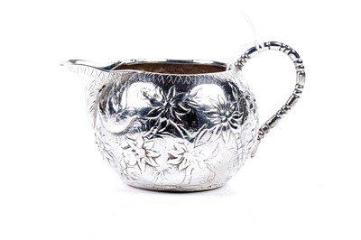 Lot 643 - A Victorian Aesthetic Movement silver milk jug