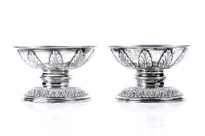 Lot 644 - A pair of Edwardian silver candle stands