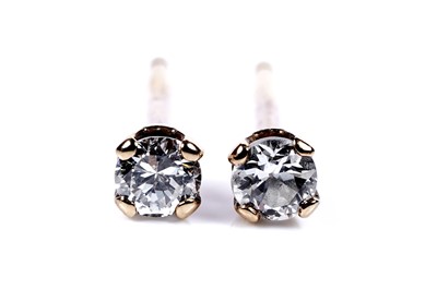 Lot 597 - A pair of diamond stud earrings