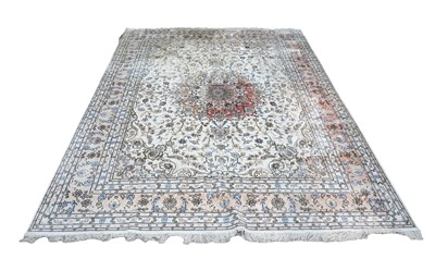 Lot 104 - A late 20th Century silk Kashan style rug