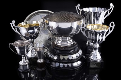 Lot 422 - A collection of five silver plated trophies; and other items