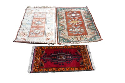 Lot 105 - A collection of three rugs