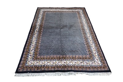 Lot 111 - A modern Caucasian-style carpet