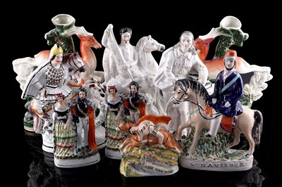 Lot 288 - A collection of 19th Century and later Staffordshire flatback figures