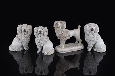Lot 278 - A Lloyd poodle; and three others