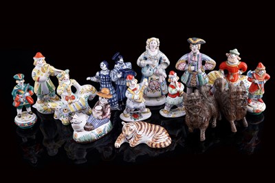 Lot 378 - A collection of Russian ceramic figures; and two carved wood Dogs of Pho