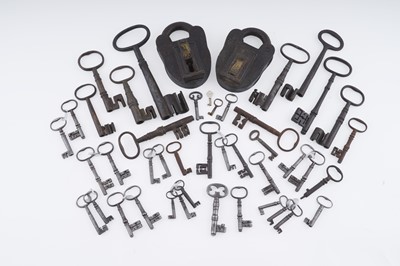 Lot 426 - A collection of antique keys; and two large antique iron padlocks