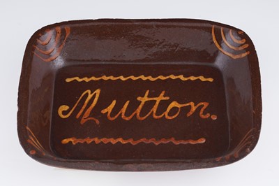 Lot 314 - A Buckley pottery slipware dish