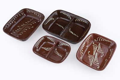 Lot 315 - A collection of slipware dishes