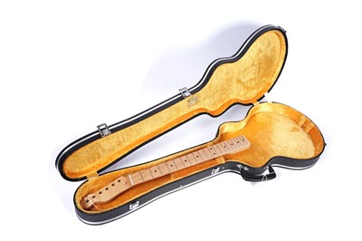 Lot 80 - A left handed guitar neck; with plush lined guitar case