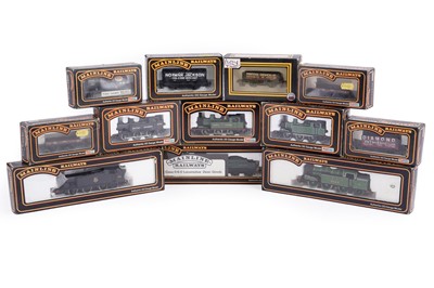 Lot 208 - Six boxed Palitoy Mainline 00-gauge locomotives; and six boxed wagons