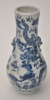 Lot 136 - Chinese blue and white slender baluster shaper...
