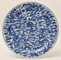 Lot 147 - Chinese blue and white dragon dish, with...