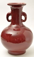 Lot 166 - Chinese copper red glazed bottle vase, the...