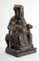 Lot 171 - Chinese black lacquer figure of a Luohan,...