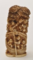 Lot 196 - Japanese carved bone Okimono, of figures in a...