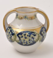 Lot 276 - Moorcroft MacIntyre miniature two handled vase,...