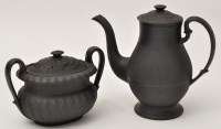 Lot 299 - Black basalt coffee pot and cover, finely...