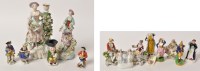 Lot 311 - Derby style candlestick figure, of lady in...