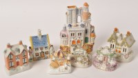 Lot 312 - Eleven flatback castle or cottage ornaments,...