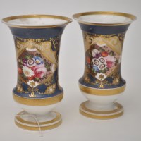 Lot 323 - Pair of blue ground spill vases, reserve...