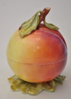 Lot 344 - Royal Worcester peach shaped preserve jar and...